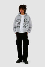 Sweat à capuche zippé avec logo fleuri