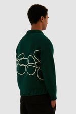 Pull en maille avec logo fleuri