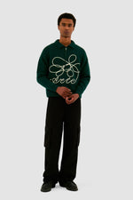Pull en maille avec logo fleuri