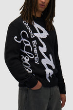 Pull en maille à gros motifs